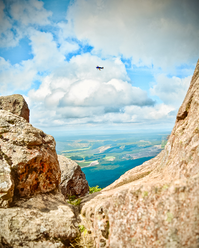 lite aircraft flying around mount tauhara