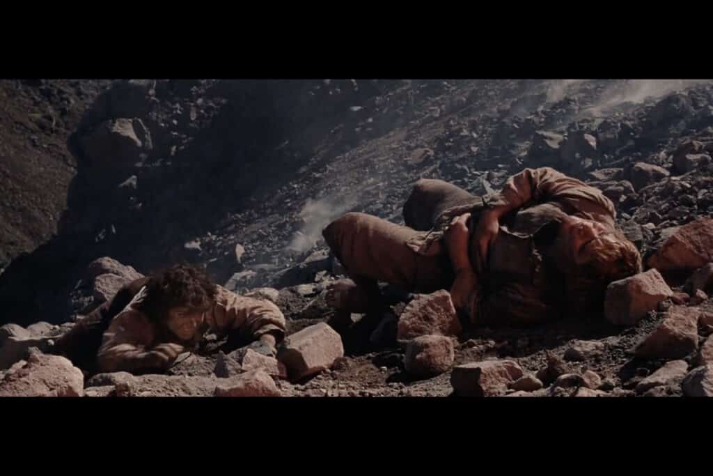 Frodo Climbing Mount Doom with his best mate Sam.
