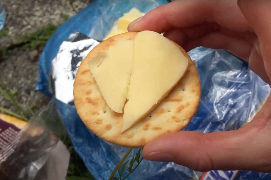 round cracker with cheese slice